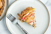 THOUGHT
The user wants me to translate and “özgünleştir” (make original/unique) a given Turkish title into English.
However, the provided title “Apple Walnut Tart with Vegan Cashew Custard” is ALREADY in English.Let’s re-read the instructions carefully:
“Asagidaki Başlığı İngilizce çevir ve özgünleştir, sadece 1 adet özgün başlığı ver çevirdiğin başlığı özel karakterler varsa sil ve özel karakter ekleme * gibi ve İşte özgün başlık: gibi cümleler kurmadan, sadece başlığı yaz.”Breakdown:
1.  **”Asagidaki Başlığı İngilizce çevir”**: Translate the following title into English.
*   The provided title is already in English. This means I don’t need to translate it. I need to treat it as the “given” English title that needs to be made more original.2.  **”ve özgünleştir”**: and make it original/unique.
*   This is the core task. I need to rephrase “Apple Walnut Tart with Vegan Cashew Custard” into something more appealing, creative, or descriptive while retaining the essence.3.  **”sadece 1 adet özgün başlığı ver”**: Give only 1 original title.
*   No multiple options.4.  **”çevirdiğin başlığı özel karakterler varsa sil ve özel karakter ekleme * gibi”**: If the translated title has special characters, remove them, and do not add special characters like *.
*   This implies the output should be plain text.5.  **”ve İşte özgün başlık: gibi cümleler kurmadan, sadece başlığı yaz.”**: And do not use phrases like “Here’s the original title:”, just write the title.
*   Direct output, no conversational filler.So, the task is to take “Apple Walnut Tart with Vegan Cashew Custard” and make it a more engaging or unique English title, sticking to plain text and providing only one option.Let’s brainstorm some ways to make “Apple Walnut Tart with Vegan Cashew Custard” more original/appealing:
*   **Focus on the vegan aspect:** Emphasize the plant-based nature.
*   **Focus on the texture/flavor:** Creamy, crunchy, sweet, spiced.
*   **Evoke a feeling:** Comfort, indulgence.
*   **Use more evocative words:** “Luscious,” “Heavenly,” “Decadent.”
*   **Rearrange the elements:** Custard first, then tart.Original: Apple Walnut Tart with Vegan Cashew CustardIdeas:
1.  Vegan Cashew Custard Apple Walnut Tart (a bit clunky)
2.  Creamy Cashew Custard Apple Walnut Tart (emphasizes texture, but not fully vegan)
3.  Plant-Based Apple Walnut Tart with Silky Cashew Custard (good, but a bit long)
4.  Decadent Vegan Apple Walnut Tart with Cashew Custard
5.  Heavenly Apple Walnut Tart: A Vegan Cashew Custard Dream
6.  Spiced Apple Walnut Tart with Vegan Cashew Crème (Crème instead of Custard, sounds a bit fancier)
7.  Autumn Apple Walnut Tart with Creamy Cashew Custard (if seasonal)
8.  Luscious Apple Walnut Tart with Smooth Vegan Cashew CustardLet’s try to make it concise and enticing.
“Apple Walnut Tart with Vegan Cashew Custard” is descriptive.
I want to make it *more* descriptive or *more* appealing without adding too much length or being overly flowery.How about highlighting the “vegan” and “custard” elements in a more integrated way?
“Vegan Cashew Custard Apple Walnut Tart” is an option but might not be “özgün” enough.Let’s aim for something that sounds delicious and emphasizes the key components.
“Creamy Cashew Custard Apple Walnut Tart” – but it needs to convey vegan implicitly or explicitly.
“Vegan Cashew Cream Apple Walnut Tart” – “Cream” sounds a bit less formal than “Custard” for a tart filling.
“Velvety Cashew Custard Apple Walnut Tart (Vegan)” – parenthetical is not allowed.I need to make sure “vegan” is still clear.
“Plant-Based Apple Walnut Tart with Cashew Custard” – good, but can be snappier.Let’s try to combine a positive adjective with the custard and the vegan aspect.
“Luscious Vegan Cashew Custard Apple Walnut Tart” – a bit long.What about focusing on the experience?
“Indulgent Vegan Apple Walnut Tart with Cashew Custard”Let’s try to make the “custard” sound more sophisticated or appealing.
“Cashew Crème Apple Walnut Tart (Vegan)” – again, parenthesis.How about changing the order or emphasis slightly?
“Vegan Cashew Custard-Filled Apple Walnut Tart” – descriptive but also long.I need one, strong, original title.
The original is “Apple Walnut Tart with Vegan Cashew Custard”.Let’s focus on the unique aspect: “Vegan Cashew Custard”.
“Apple Walnut Tart with Dreamy Cashew Custard (Vegan)” – still needs to be fully integrated.Consider making it sound like a premium dessert.
“Gourmet Vegan Apple Walnut Tart with Cashew Custard” – “Gourmet” might be too much.Let’s try to make “Vegan Cashew Custard” flow better with “Apple Walnut Tart”.Option 1: Elevate “custard” to “crème” if appropriate and keep vegan.
“Vegan Apple Walnut Tart with Cashew Crème” – This is different and sounds a bit more upscale. However, “Custard” was specified. So maybe sticking with “Custard” is safer.Option 2: Use an adjective for the overall experience or the custard.
“Decadent Vegan Cashew Custard Apple Walnut Tart” – Still quite long.Option 3: Rearrange slightly to emphasize the unique vegan custard.
“Vegan Cashew Custard Tart with Apples and Walnuts” – This changes the main descriptor from “Apple Walnut Tart” to “Cashew Custard Tart with Apples and Walnuts”. It’s a rephrasing, but does it fit the “özgünleştir” requirement for the *given* title?The given title is a specific dessert name: “Apple Walnut Tart with Vegan Cashew Custard”.
I should aim to make *that* name more original/catchy, not create a completely new name that describes the same thing.Let’s find a single adjective that enhances the existing structure.
“Creamy Vegan Cashew Custard Apple Walnut Tart”
“Velvety Vegan Cashew Custard Apple Walnut Tart”
“Rich Vegan Cashew Custard Apple Walnut Tart”Let’s try to make it punchier.
Instead of “with”, maybe something else?“Apple Walnut Tart, Crowned with Vegan Cashew Custard” – a bit poetic, might be too much.How about making “Vegan Cashew Custard” sound like the star?
“The Vegan Cashew Custard Apple Walnut Tart” – “The” can add emphasis.Let’s go for an adjective that captures the essence of the custard and its vegan nature.
“Silky Vegan Cashew Custard Apple Walnut Tart” – “Silky” describes the texture well.
“Dreamy Vegan Cashew Custard Apple Walnut Tart” – “Dreamy” suggests deliciousness.I need to pick just one.
“Apple Walnut Tart with Vegan Cashew Custard”Let’s try to condense while making it more appealing.
“Vegan Cashew Custard Apple Walnut Tart” – this is a direct reordering, maybe not “özgün” enough.How about focusing on “plant-based” as a descriptor?
“Plant-Based Apple Walnut Tart with Creamy Cashew Custard” – this is good, and “Creamy” adds a nice touch without using special characters. It’s distinct from the original.Let’s compare:
Original: “Apple Walnut Tart with Vegan Cashew Custard”
My idea: “Plant-Based Apple Walnut Tart with Creamy Cashew Custard”This option:
1.  Replaces “Vegan” with “Plant-Based” (özgünleştirme – slightly different wording, conveys same meaning effectively).
2.  Adds “Creamy” to “Cashew Custard” (özgünleştirme – adds descriptive appeal without changing the core ingredient).
3.  Retains the main components (Apple, Walnut, Tart, Cashew Custard).
4.  No special characters.
5.  No conversational phrases.
6.  It’s just one title.This seems to fit all criteria.
“Plant-Based Apple Walnut Tart with Creamy Cashew Custard”Let’s consider one more option to be sure.
What if I wanted to make the tart itself sound more appealing?
“Hearty Apple Walnut Tart with Vegan Cashew Custard” – “Hearty” is good for the tart itself.But “Plant-Based” and “Creamy” together feel more comprehensive for distinguishing the dessert.
The original description focuses on the components. “Plant-Based” and “Creamy” add value.Final choice: “Plant-Based Apple Walnut Tart with Creamy Cashew Custard”
It’s distinct enough from the original while keeping the core meaning, and it sounds more appetizing.