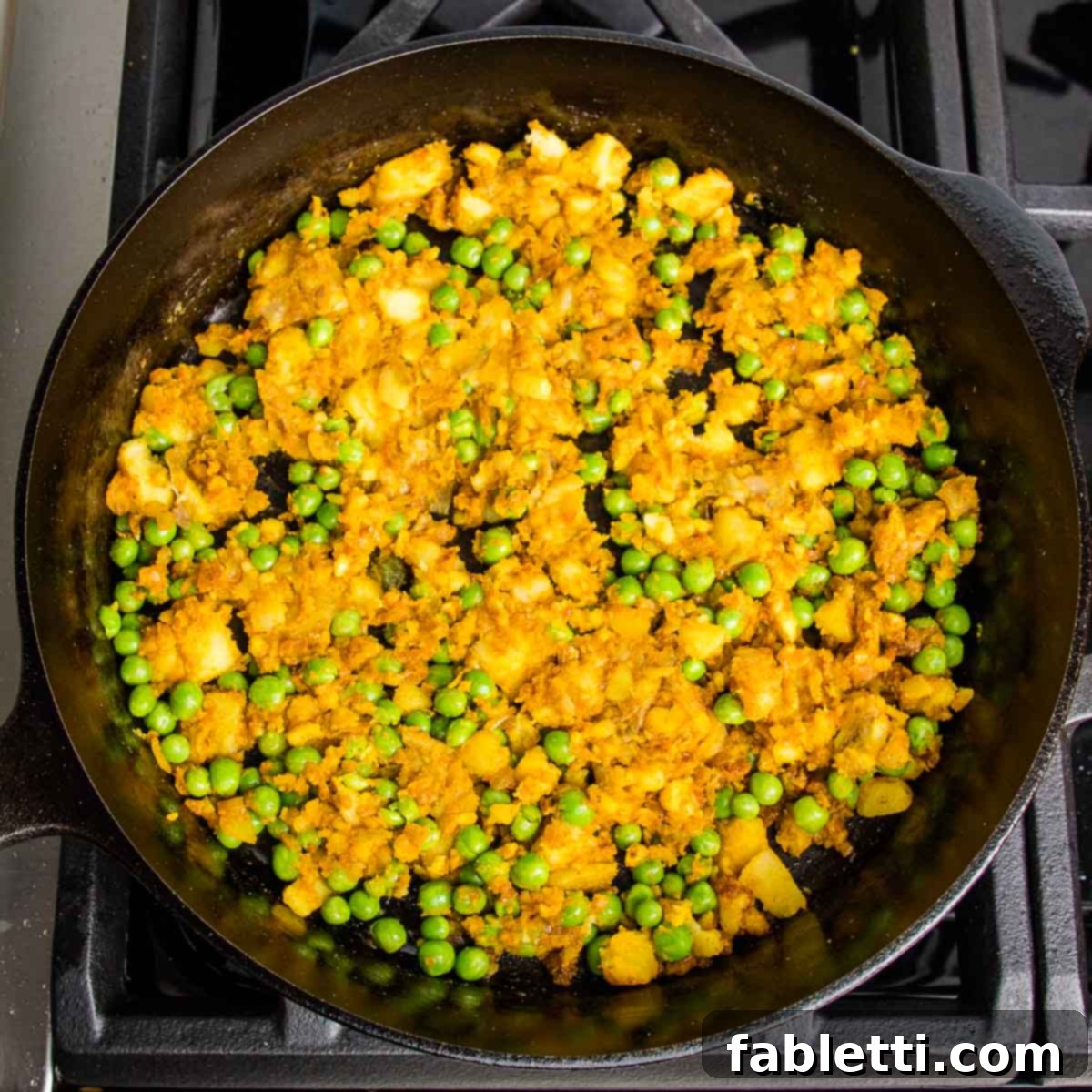 Crispy Baked Samosas with Zesty Cilantro Chutney 8 cast iron skillet with samosa filling; potatoes, peas, onions and spices.
