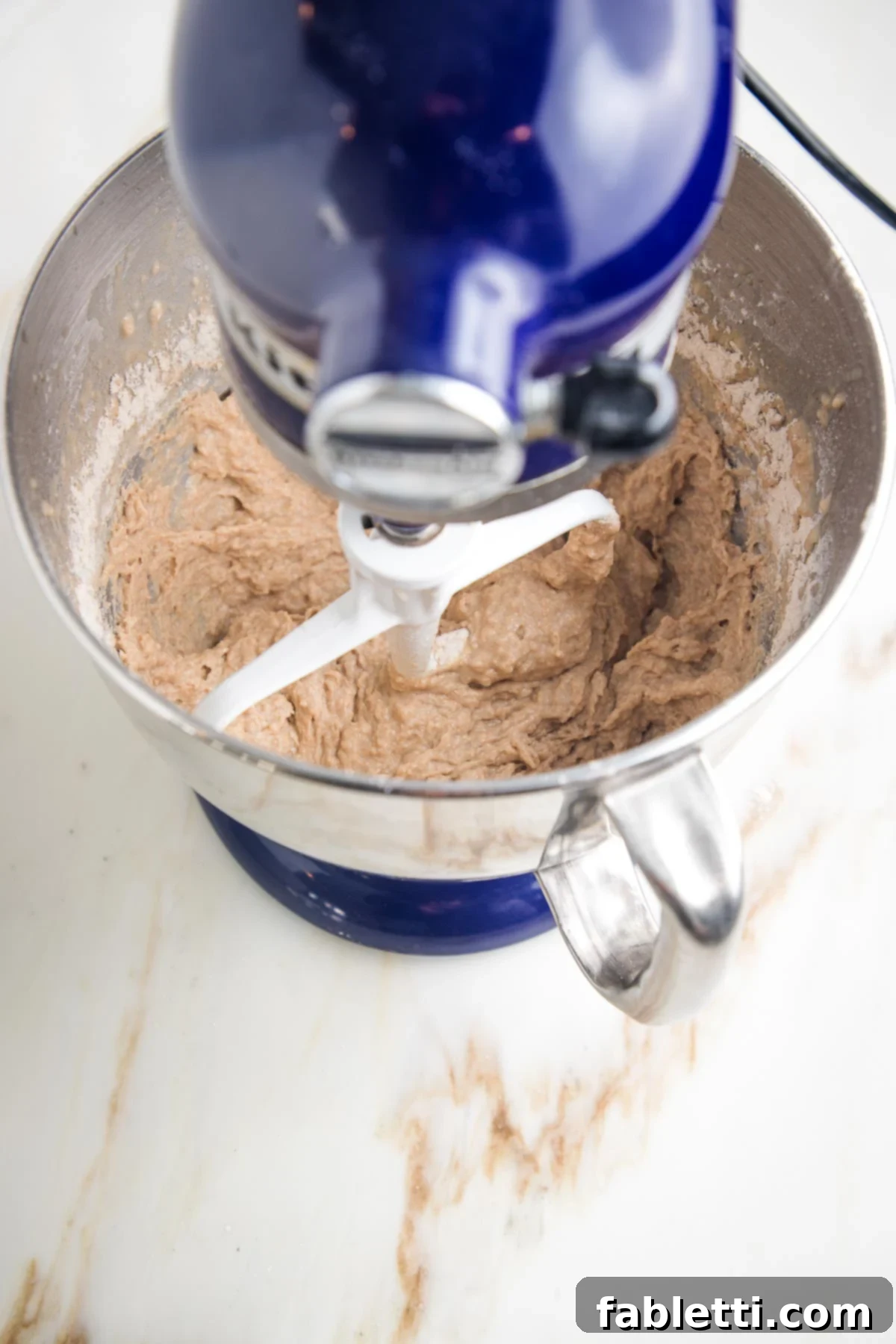Fluffy Vegan Dinner Rolls 9 Stand mixer with paddle attachment mixing dough