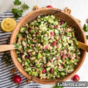 Zesty Kidney Bean Salad 13 wooden bowl filled with bean salad including kidney beans, white beans, lots of green and radishes.