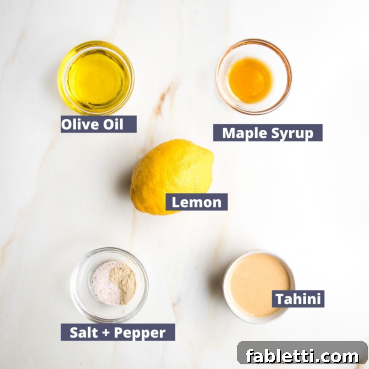 Zesty Kidney Bean Salad 6 labeled ingredients for lemon tahini dressing: olive oil, maple syrup, lemon, tahini, salt and pepper