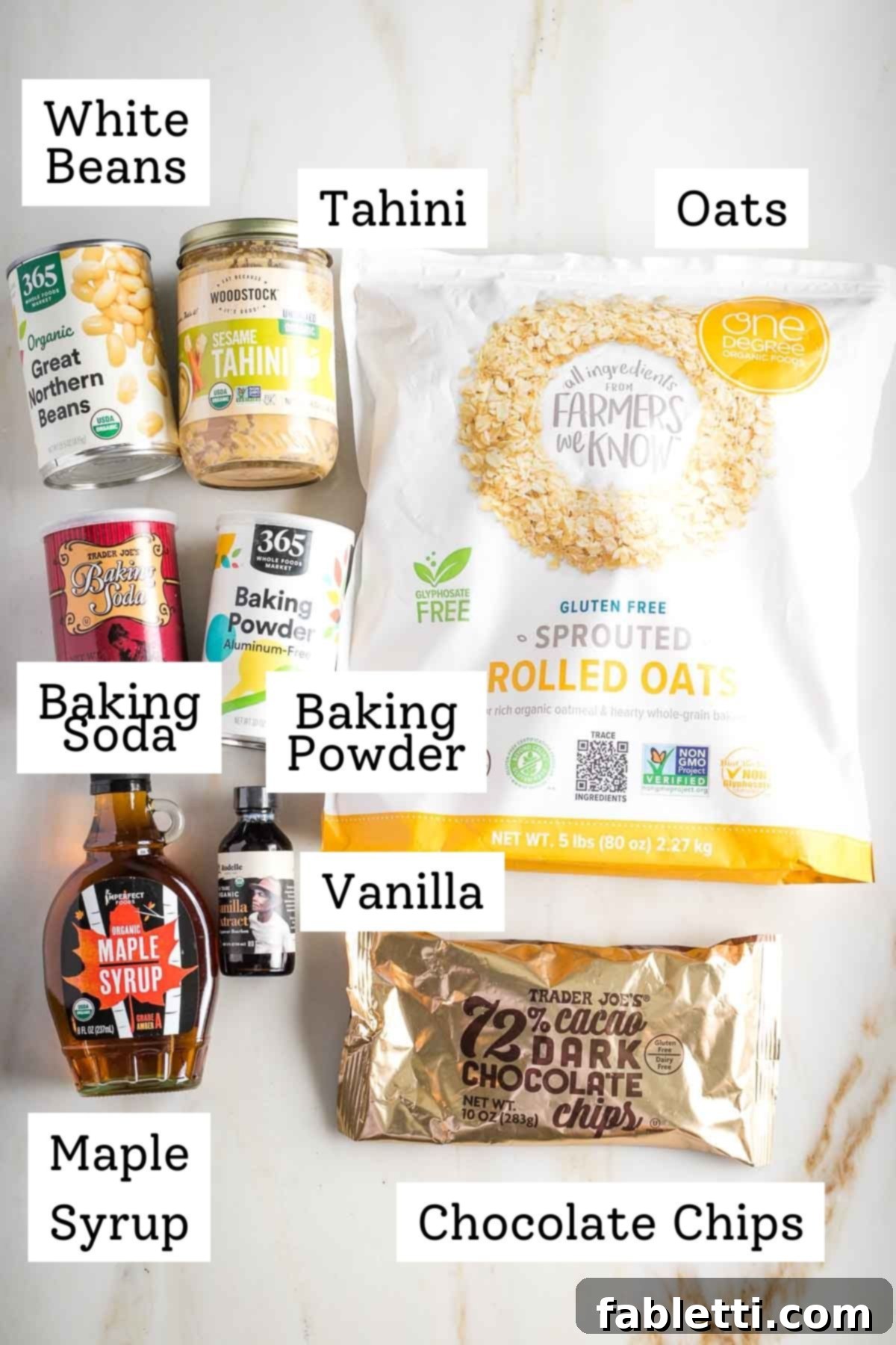 Bean-Powered Vegan Blondies 4 Labeled ingredients: oats, white beans, tahini, baking powder and soda, maple syrup, vanilla and chocolate chips.