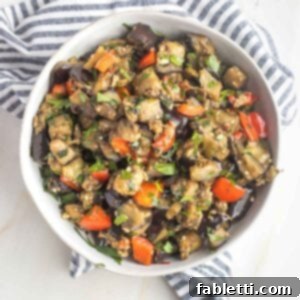 Savory Sautéed Eggplant Salad 15 Bowl of cubed and sauteed eggplant with garlic, red peppers and fresh parsley.