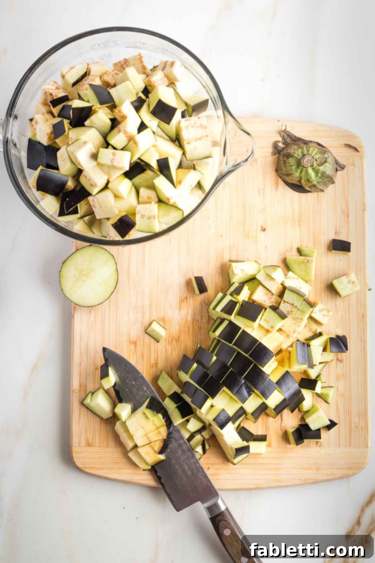 Savory Sautéed Eggplant Salad 7 Approximately 8 cups of cubed eggplant in a large bowl, ready for cooking.