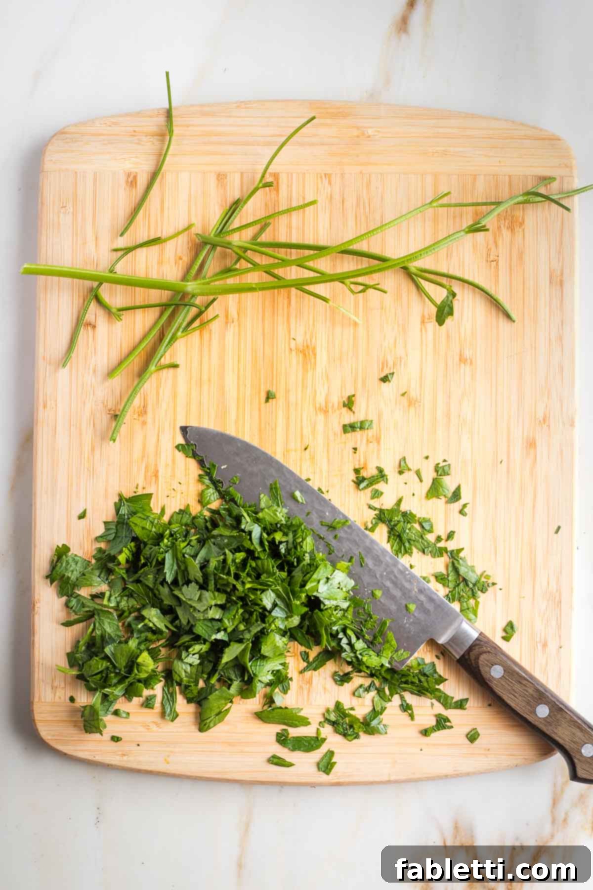 Savory Sautéed Eggplant Salad 8 Fresh parsley leaves separated from their stems and then roughly chopped, ready for the recipe.