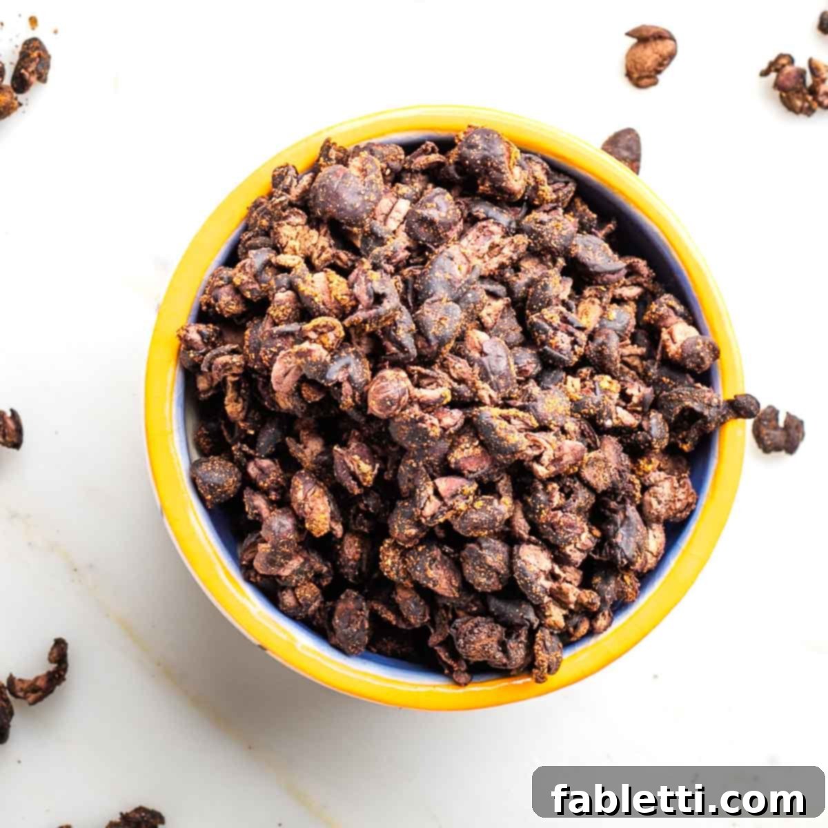 Crunchy Taco Black Beans 11 Yellow rimmed bowl filled with crunchy black bean snack. A vibrant and appealing presentation.