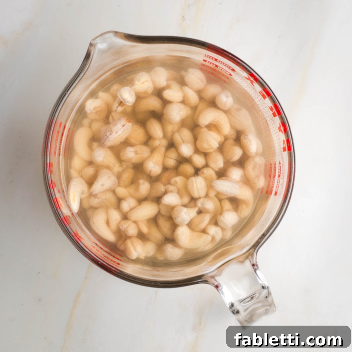 Luscious Vegan Parsnip Gratin 6 Cashews covered in water.