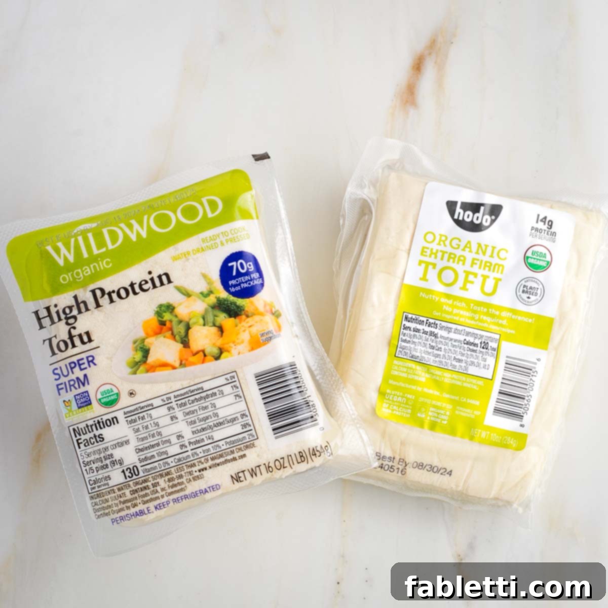 Flavorful Vegan Tofu Shawarma 3 Two different brands of extra firm tofu, emphasizing the importance of choosing the right type for this recipe.
