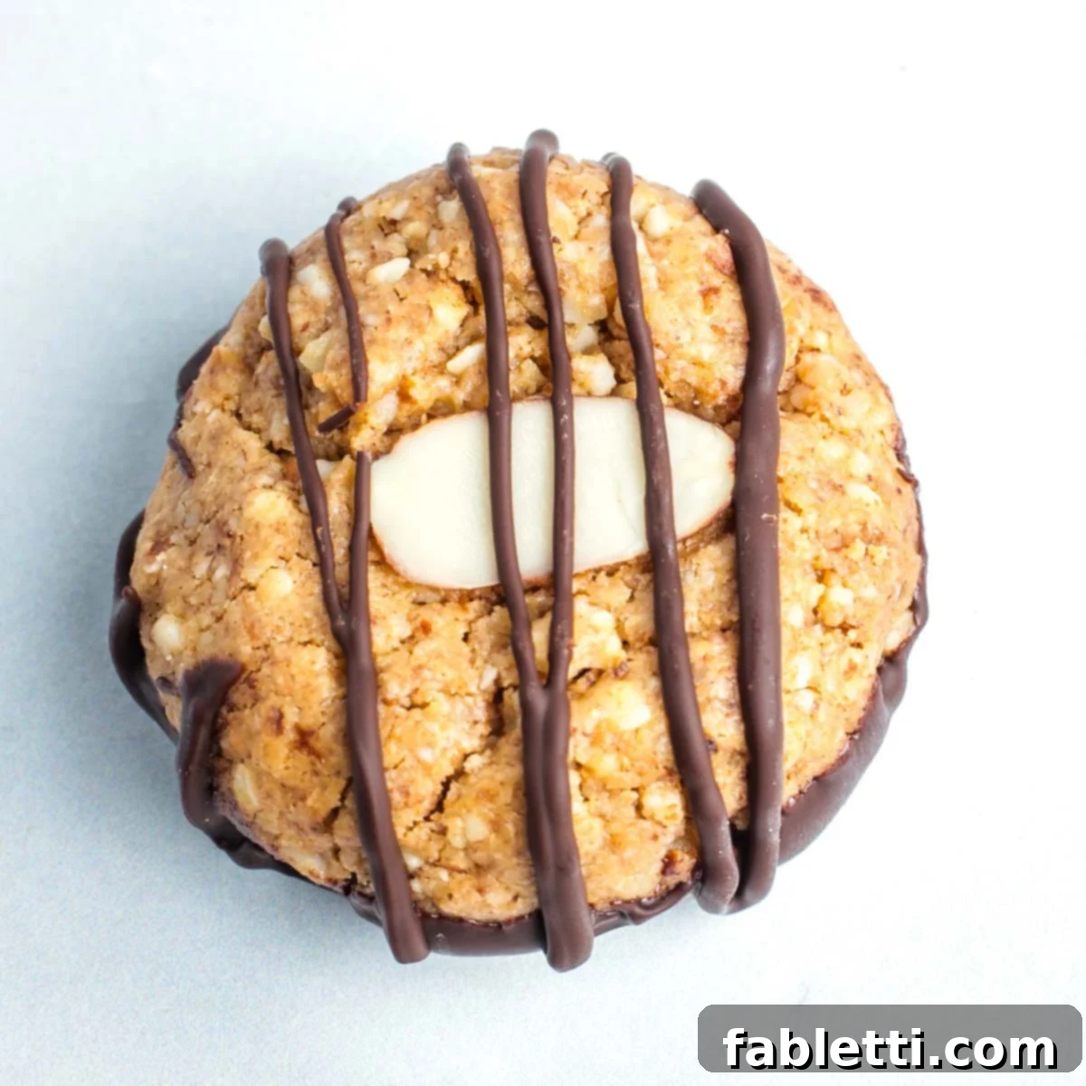 Decadent Vegan Chocolate Almond Macarons 21 Stack of vegan almond macaroons in an airtight container, ready for storage.