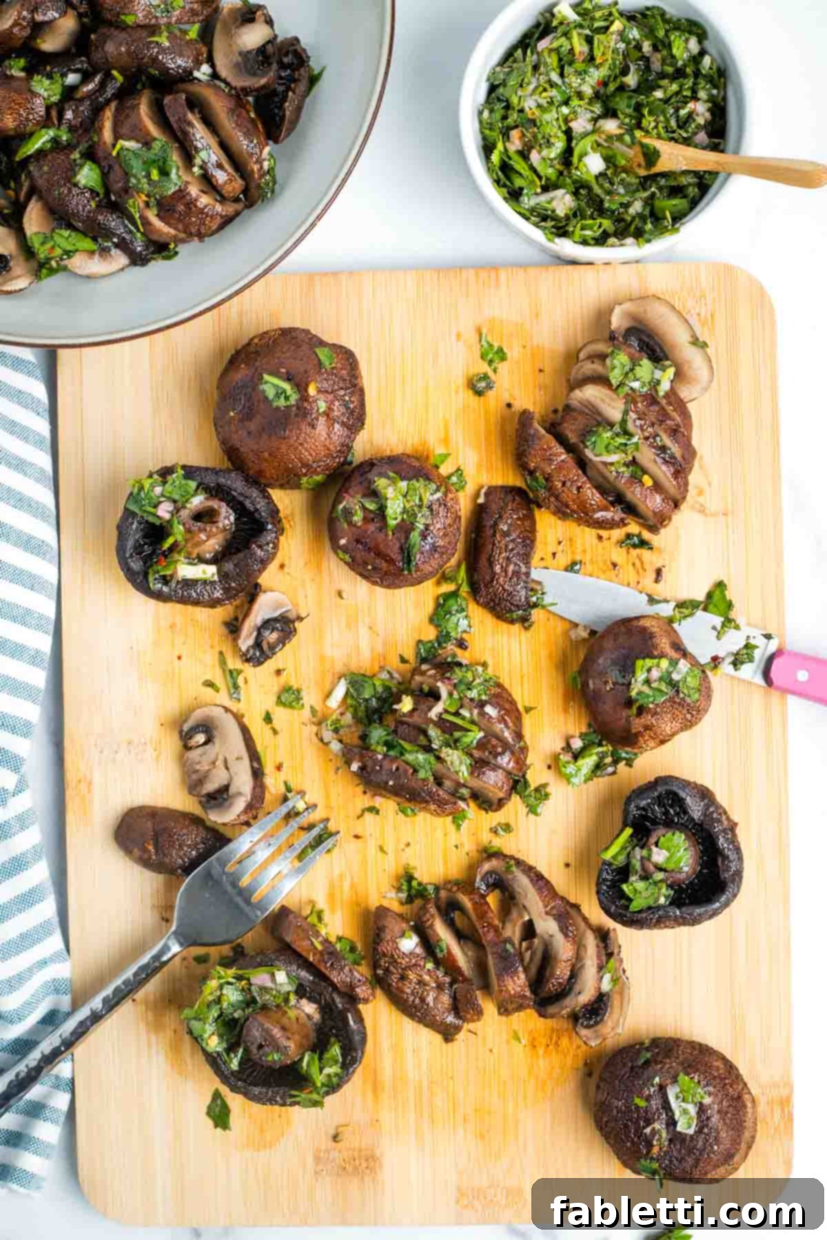Zesty Chimichurri Portobello Steaks 16 Slicing roasted portobello mushrooms, then slathering with chimichurri.