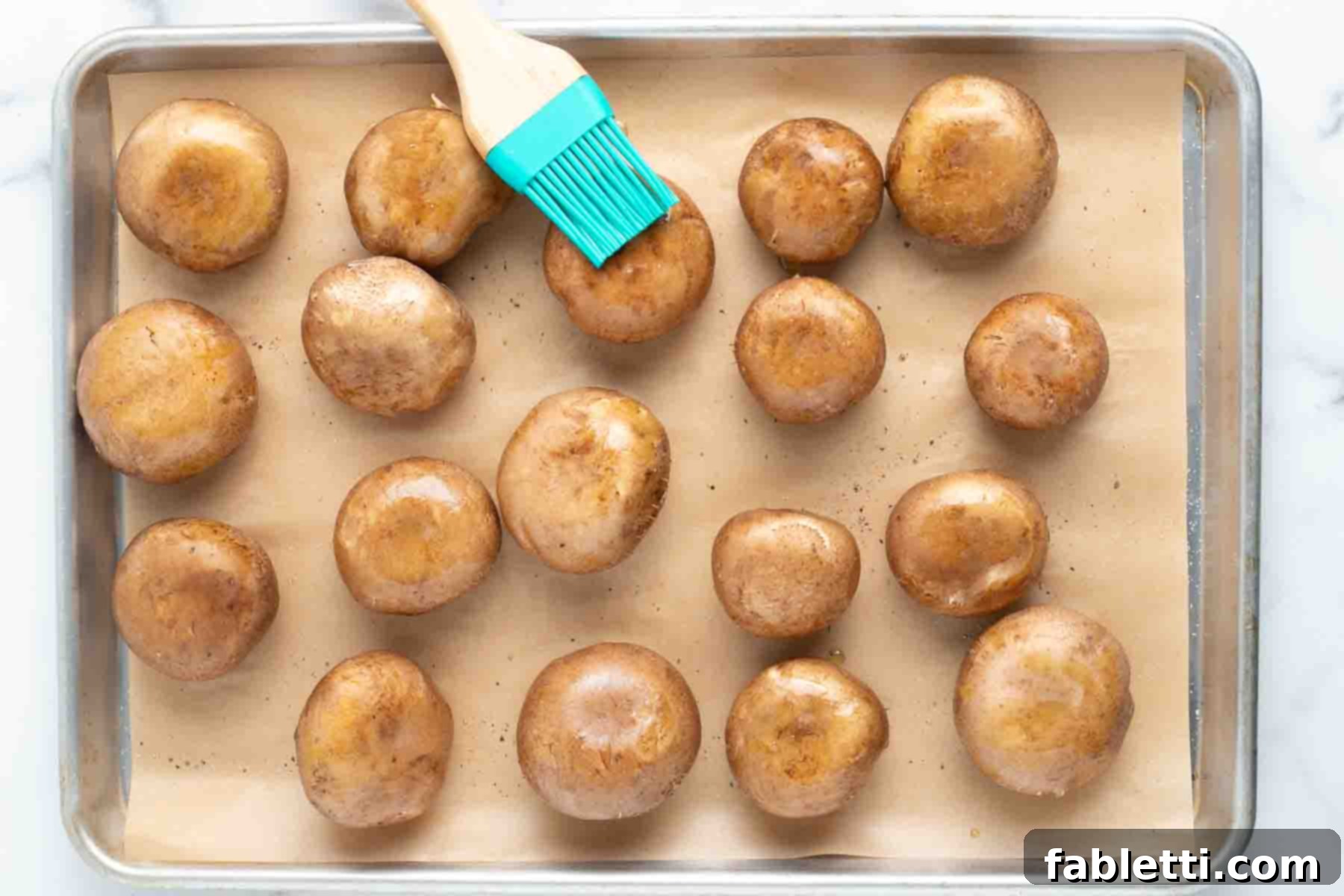 Zesty Chimichurri Portobello Steaks 6 Pastry brush, adding oil to mushroom caps.
