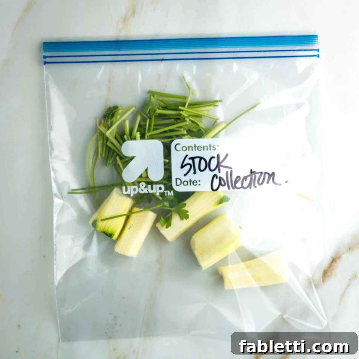 Fresh Spring Roll Salad Bowl with Creamy Peanut Sauce 20 zip top bag labeled "stock collection" with zucchini pieces and parsley stems.