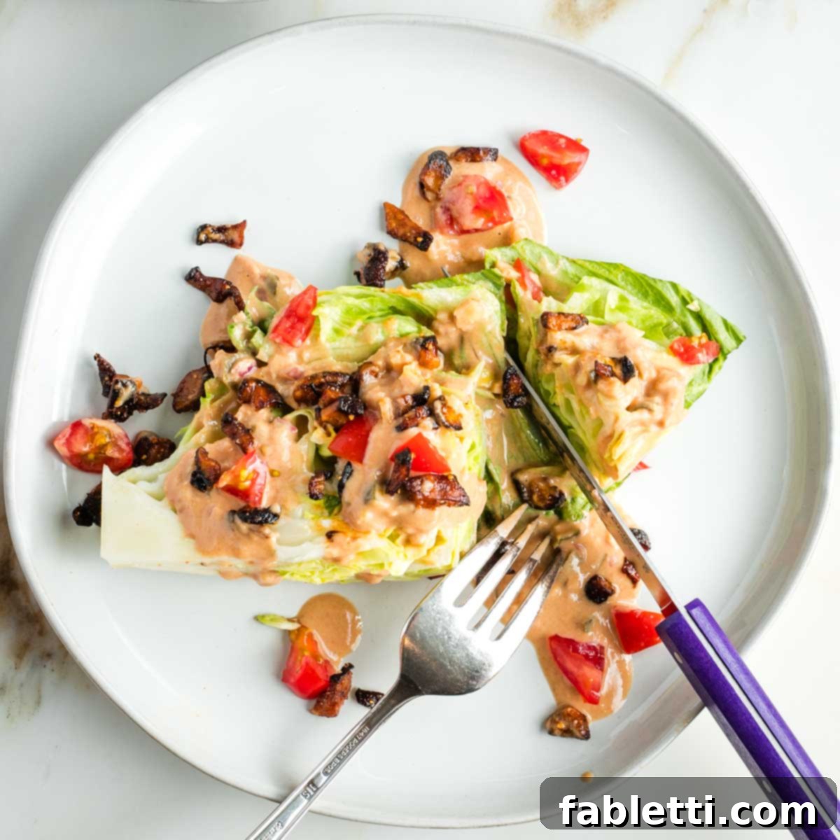 Smoky Shiitake and Zesty Russian Vegan Wedge 16 A close-up shot of a perfectly assembled vegan wedge salad, highlighting its freshness and delicious toppings.