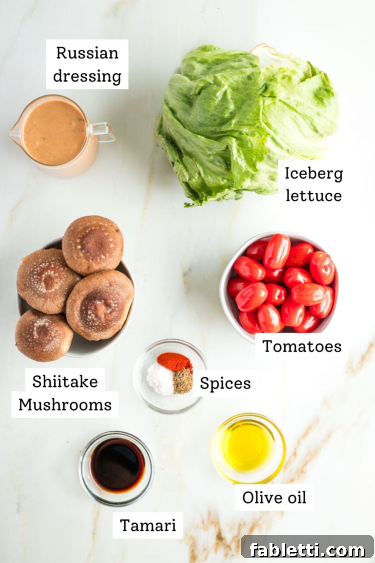 Smoky Shiitake and Zesty Russian Vegan Wedge 3 Fresh shiitake mushrooms, ripe tomatoes, and a crisp head of iceberg lettuce, ready for preparation.