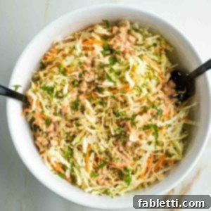 Shredded savoy cabbage and carrots, tossed in a Russian dressing.
