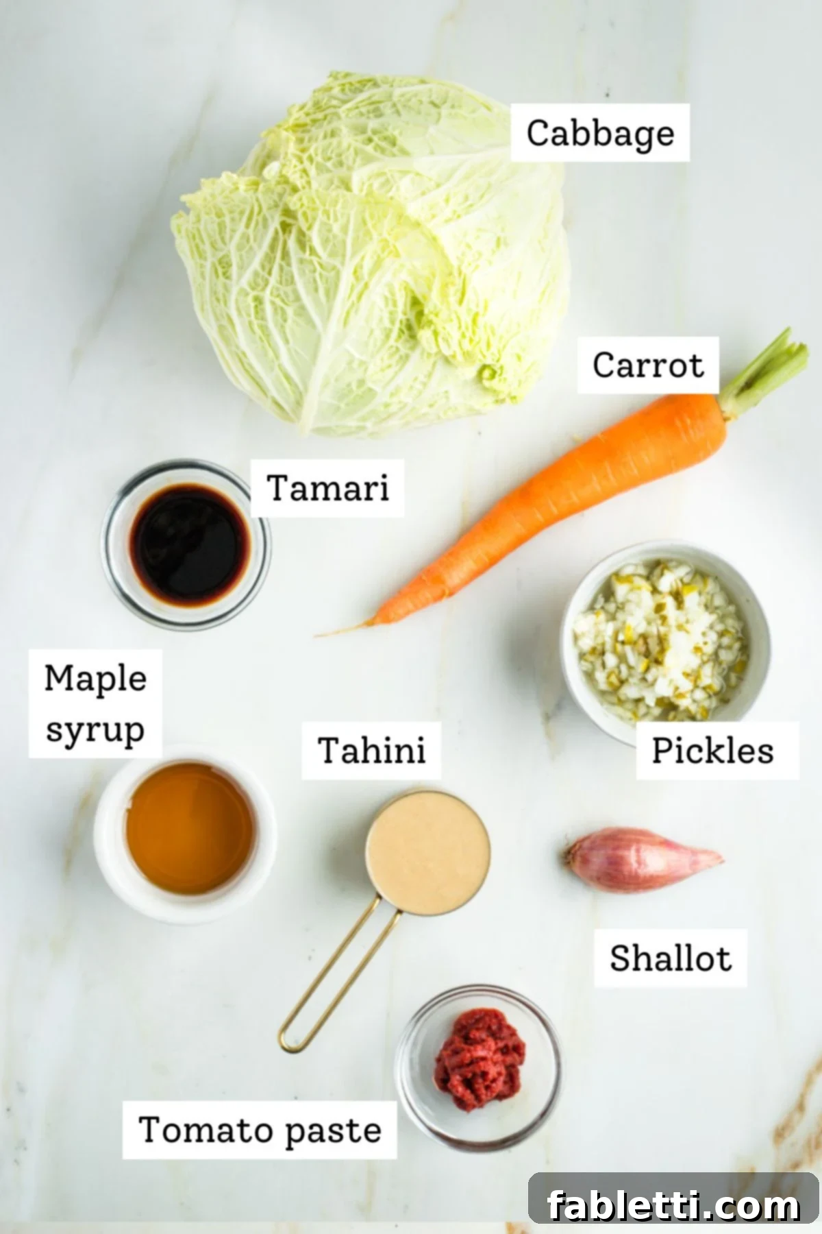 Labeled ingredients for cabbage and carrot slaw with Russian dressing.