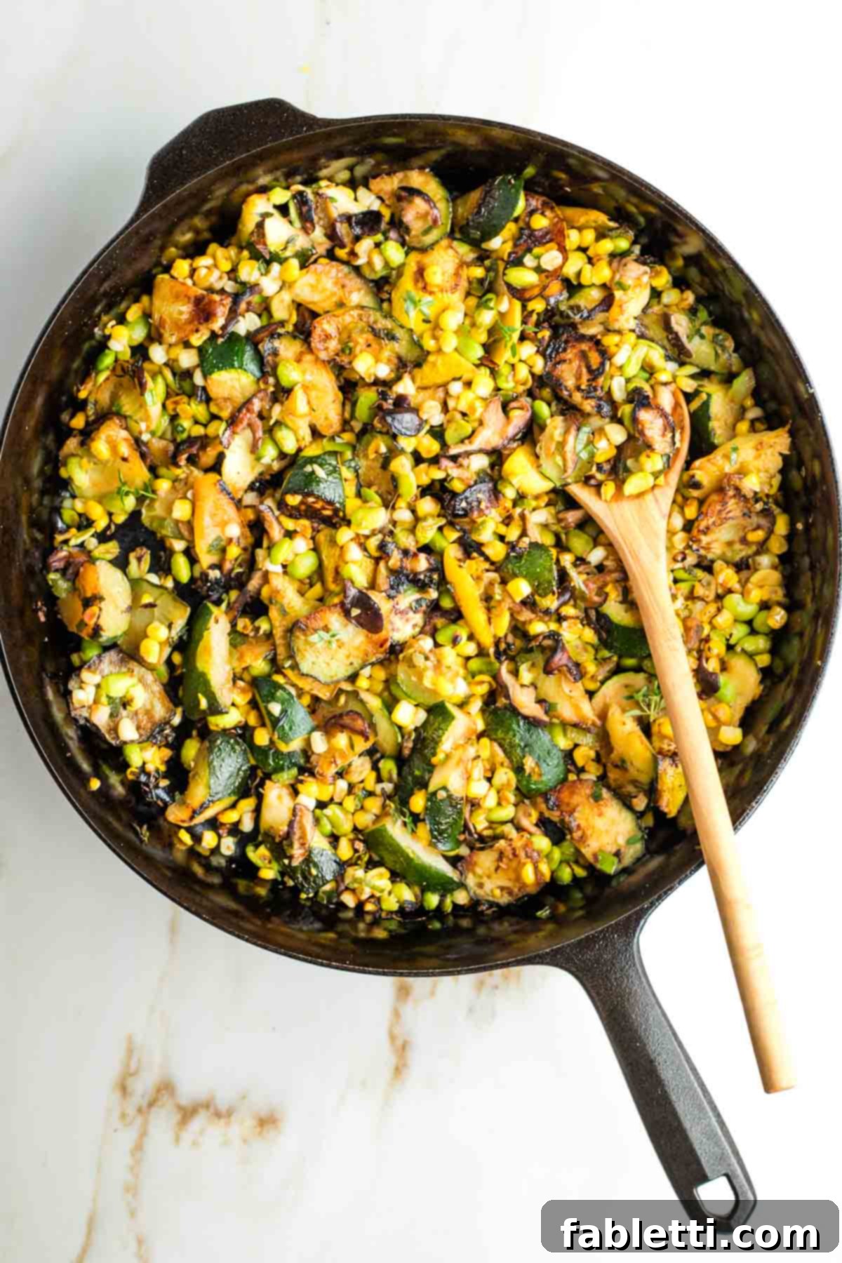 Vegan Zucchini Skillet Dinner in Just 20 Minutes 14 A beautifully plated serving of the vegan zucchini skillet dinner, garnished with fresh herbs.