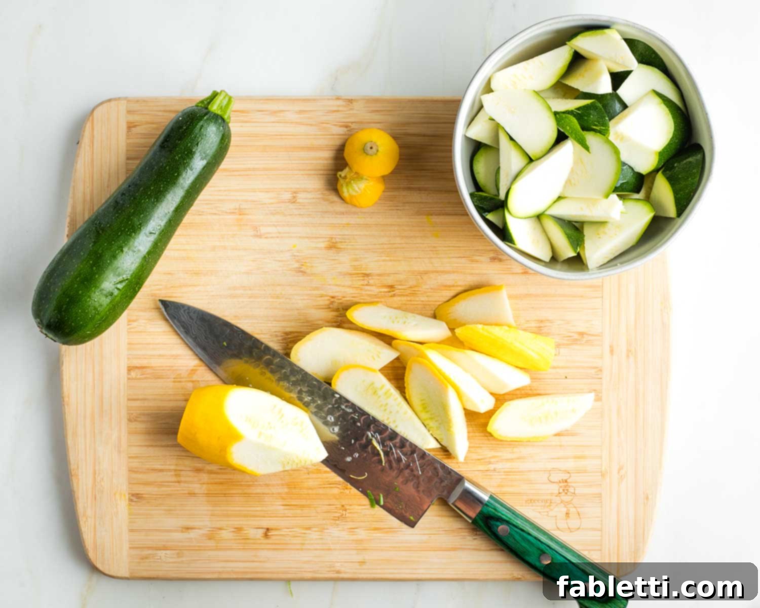 Vegan Zucchini Skillet Dinner in Just 20 Minutes 4 Zucchini and summer squash cut into diagonal type of cubes.