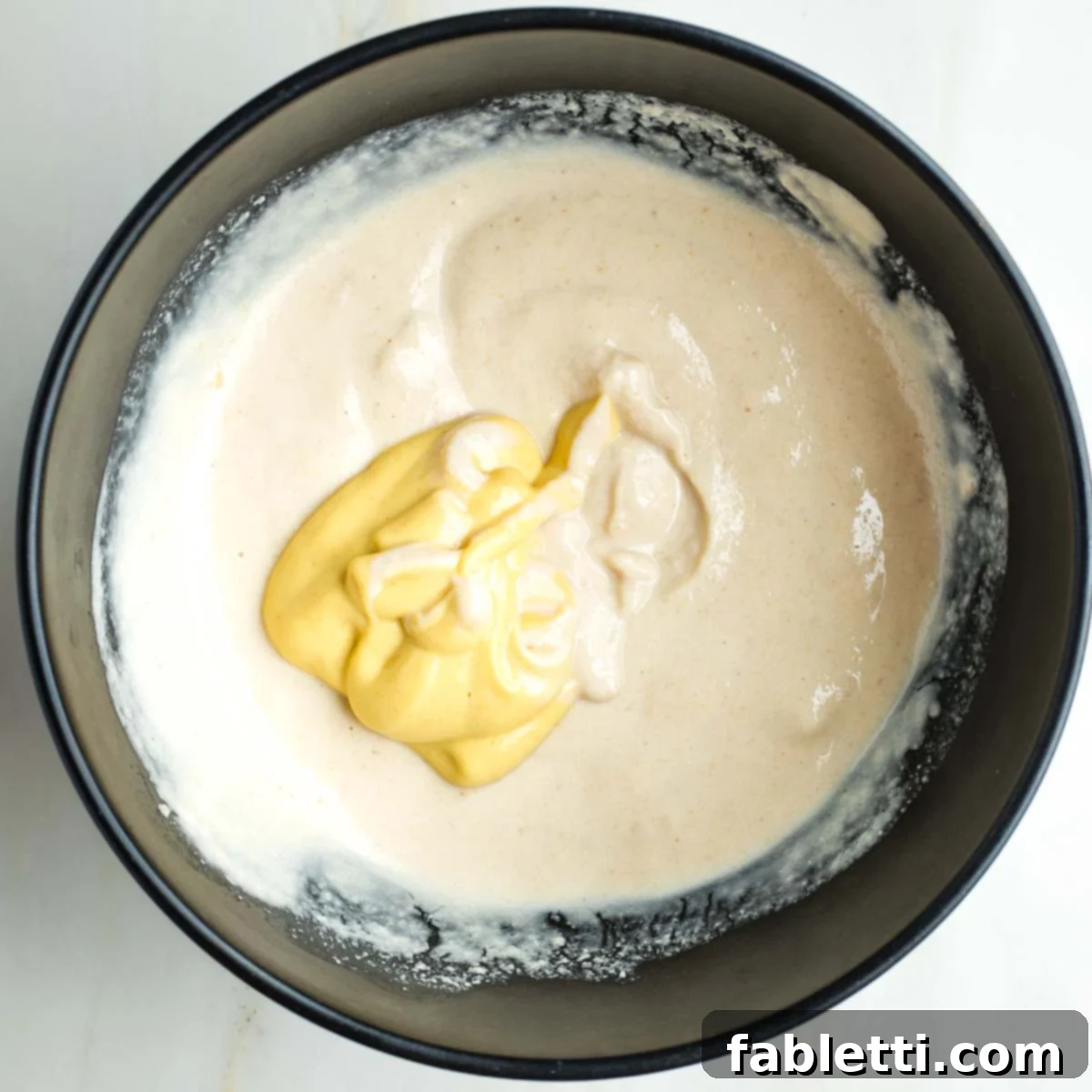 Zingy Vegan Tofu Egg Salad 13 Vegan mayonnaise with a large dollop of dijon mustard.