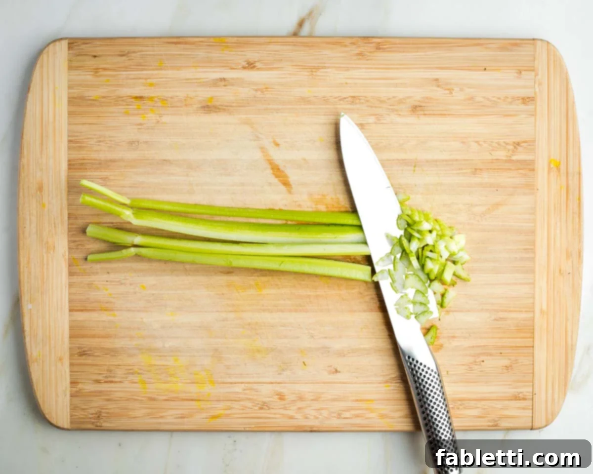 Zingy Vegan Tofu Egg Salad 4 One stalk of celery cut lengthwise into strips and then across to make small diced pieces.