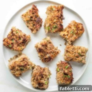 Ultimate Vegan Potato Kugel 17 Plate with squares of potato kugel on it.