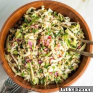 Vibrant Apple Fennel Farro Salad with Pomegranate Gems 16 Colorful chopped salad with pomegranate, fennel, apple, onion, cabbage and pomegranate tahini dressing.