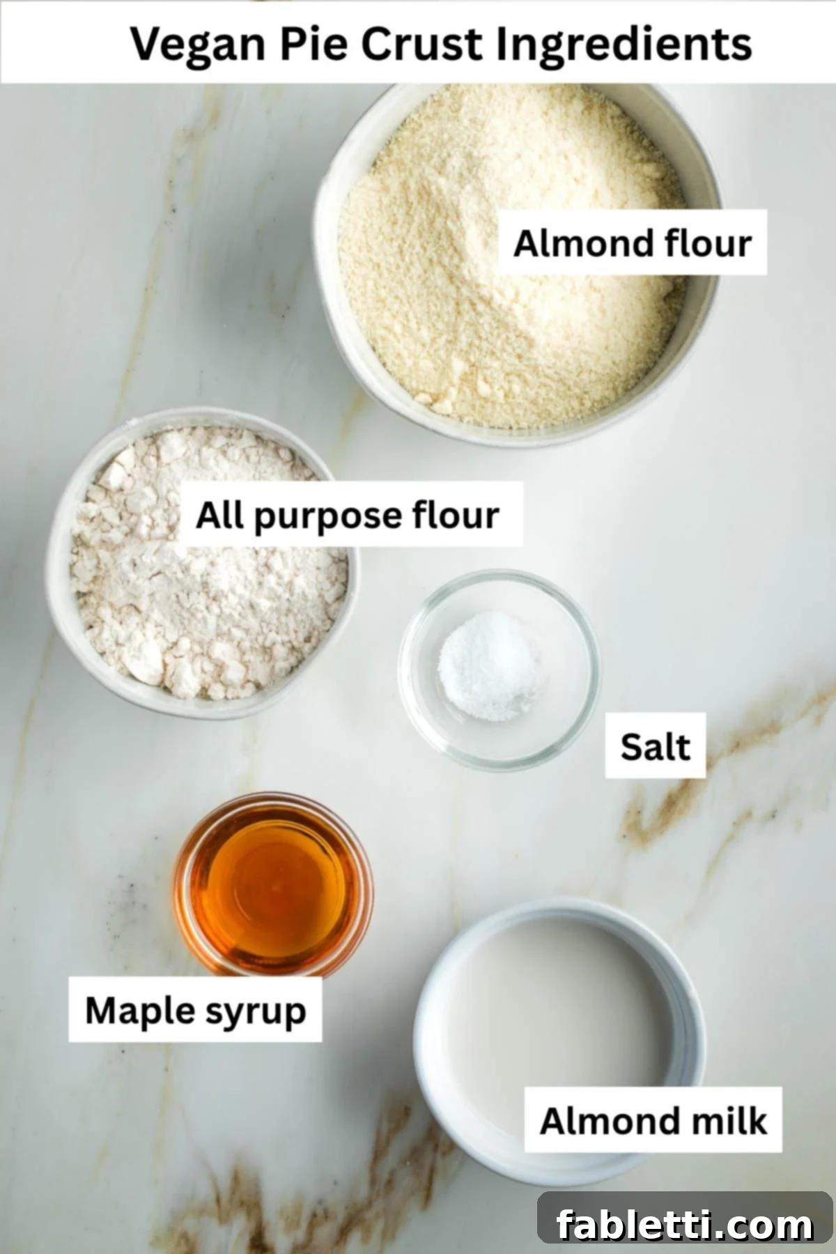 Effortless Vegan Pumpkin Pie with a Homemade Dairy-Free Crust 4 Clearly labeled ingredients for the homemade vegan pie crust: almond flour, all-purpose flour, a small amount of maple syrup, salt, and almond milk.
