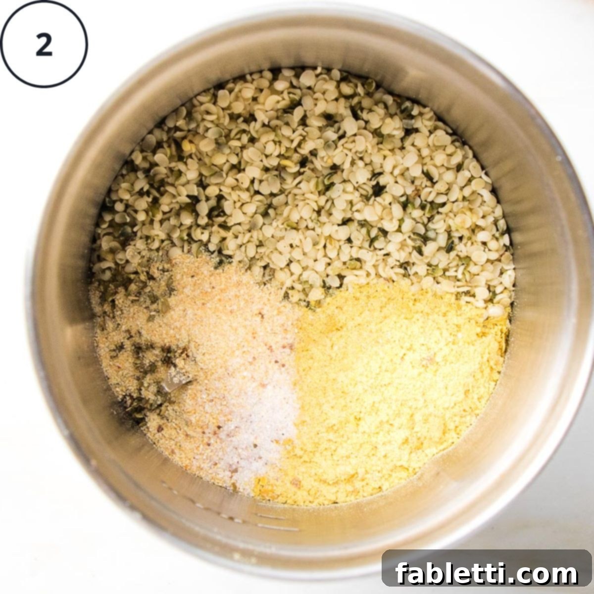 Mini Zucchini Pizzas 6 Hemp seeds, nutritional yeast, salt, garlic powder and oregano in a spice grinder.