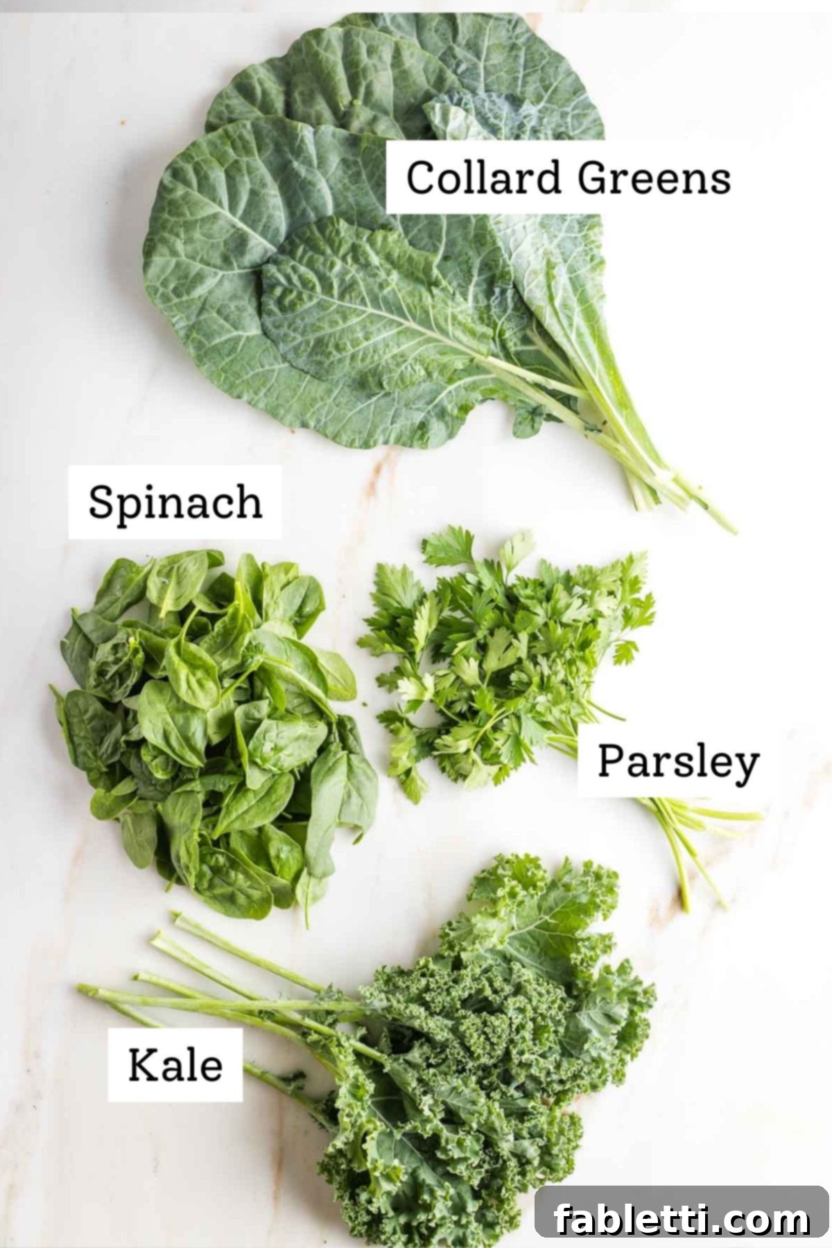 Assortment of fresh leafy greens, ready for smoothie preparation.