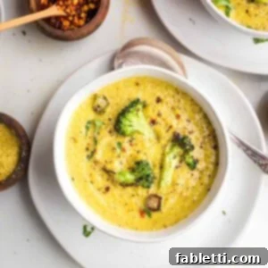 Velvety Plant-Based Broccoli Soup 20 Creamy broccoli soup with chunks of crispy broccoli on top.