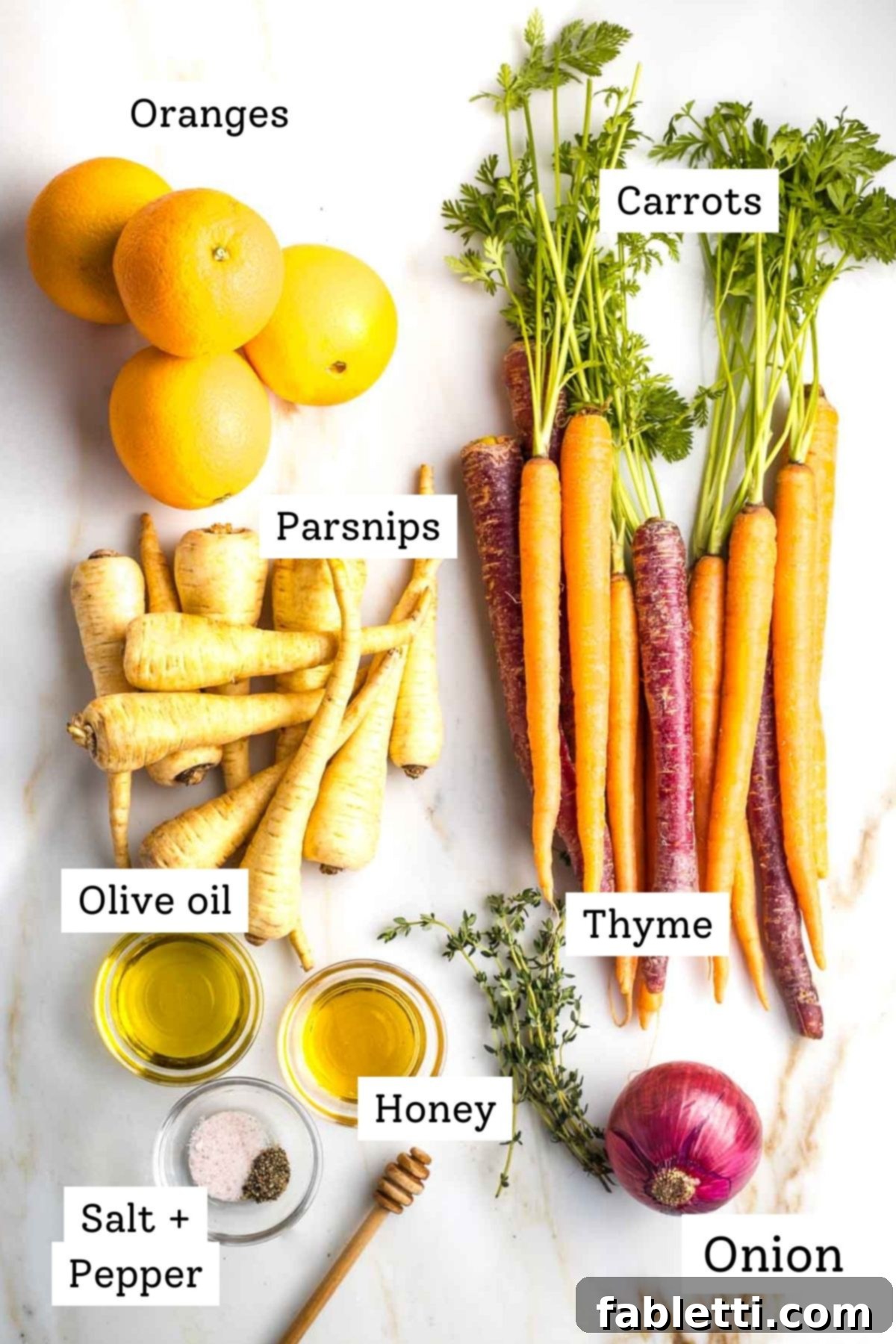 Nectar-Kissed Roasted Roots 3 A selection of fresh, colorful ingredients including parsnips, carrots, oranges, red onion, fresh thyme, olive oil, and honey, ready for preparation.