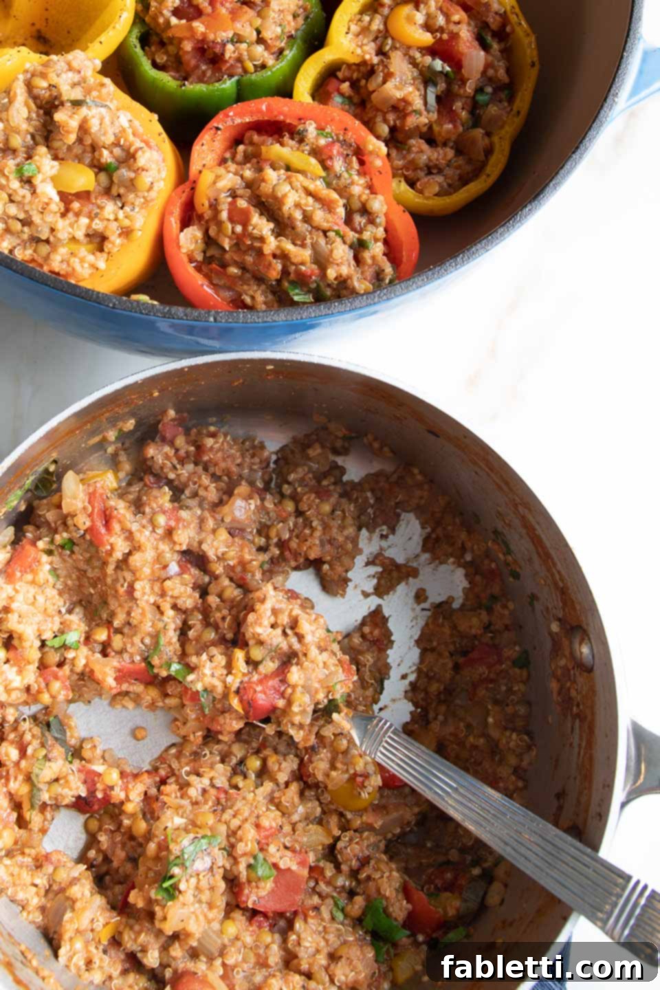 Hearty Vegan Lentil Stuffed Peppers 12 Spoonfuls of quinoa and lentil mixture being placed into par-baked bell peppers.
