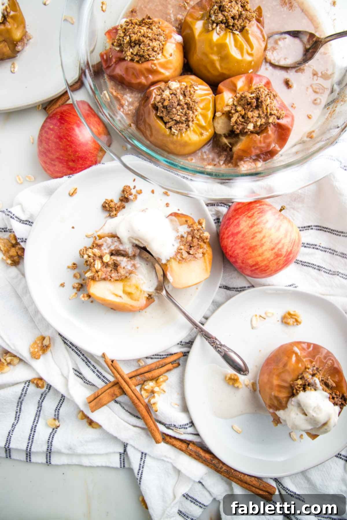 Naturally Sweet Dairy-Free Baked Apples 2 Baked apples in a pie dish and on a plate, cut in half and topped with dairy-free ice cream. A delicious and healthy dessert or breakfast option.