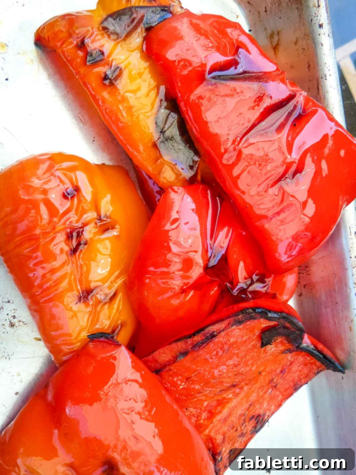 Smoky Grilled Ratatouille Salad 7 A collection of grilled vegetables waiting on a cutting board, illustrating the batch grilling process.