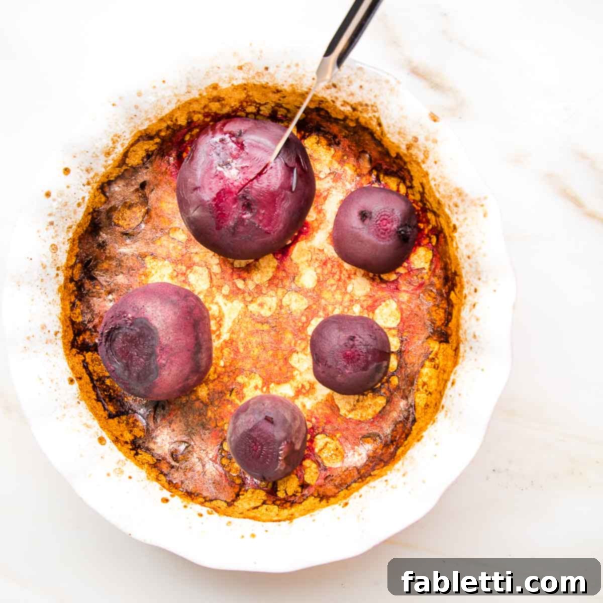 Balsamic Roasted Beet Salad 11 Whole red beets, roasted, browned in a pie plate.