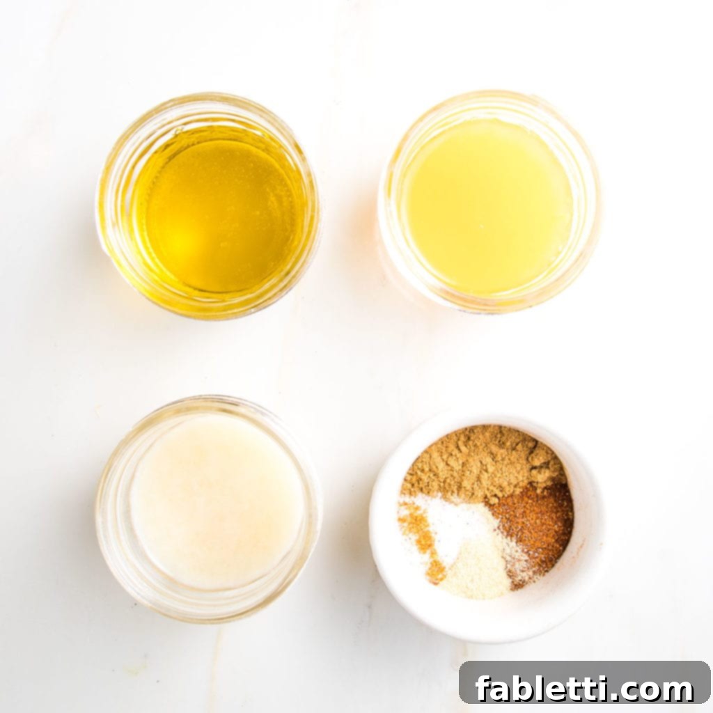 Zesty Southwest Quinoa Salad 5 Dressing ingredients in small glass dishes: olive oil, lime juice, orange juice, assorted dry spices