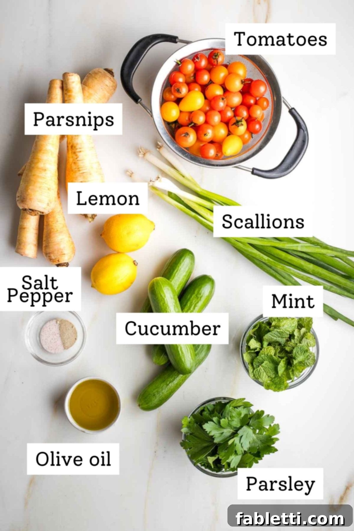 Sweet Parsnip Gluten-Free Tabbouleh 3 Selection of fresh ingredients for tabbouleh including parsnips, tomatoes, cucumbers, herbs, and lemons.