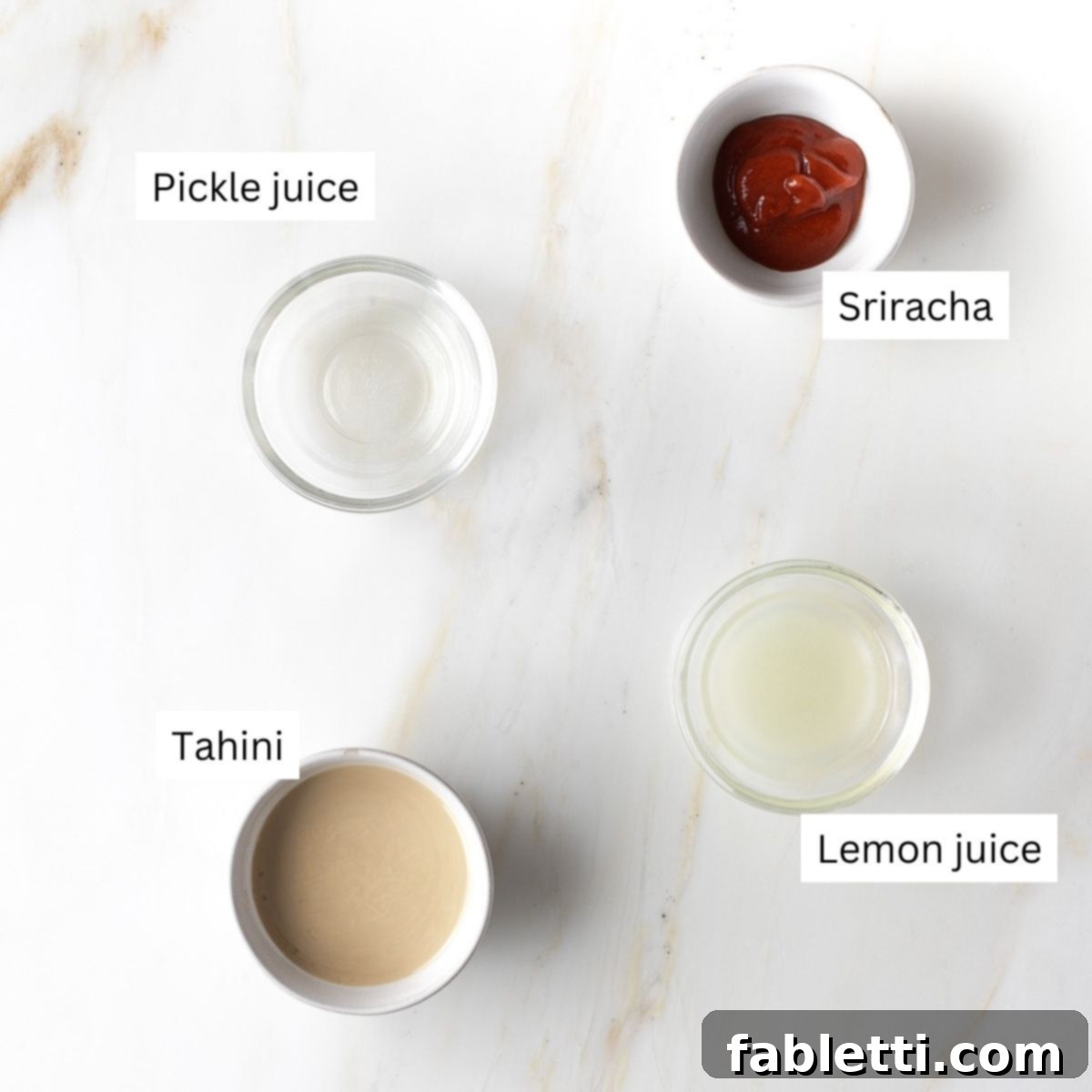 Labeled ingredients: sriracha, pickle juice, lemon juice and tahini.