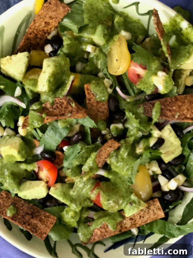 Oven-Crisped Taco Salad 8 Delicious Cilantro Dressing adds to the flavor of this vegan Taco Salad.
