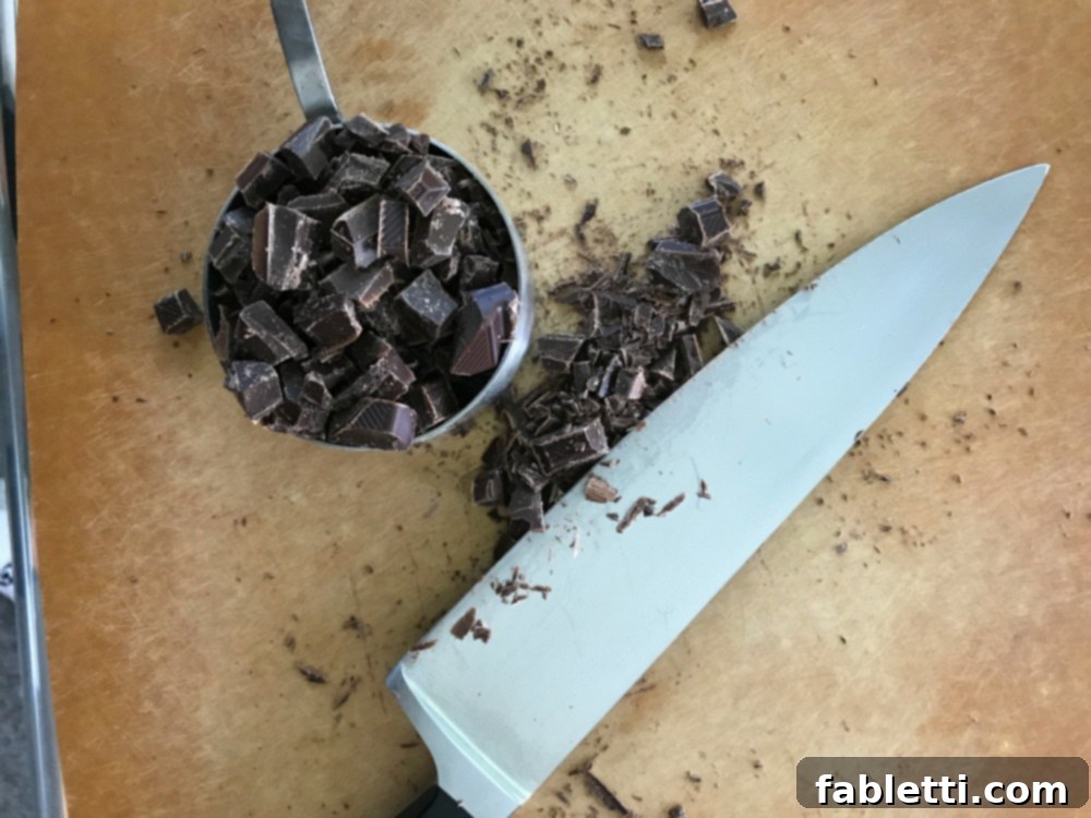 Nourishing Chocolate Oat Granola 5 Dark chocolate chopped into chunks and place in a measuring cup.