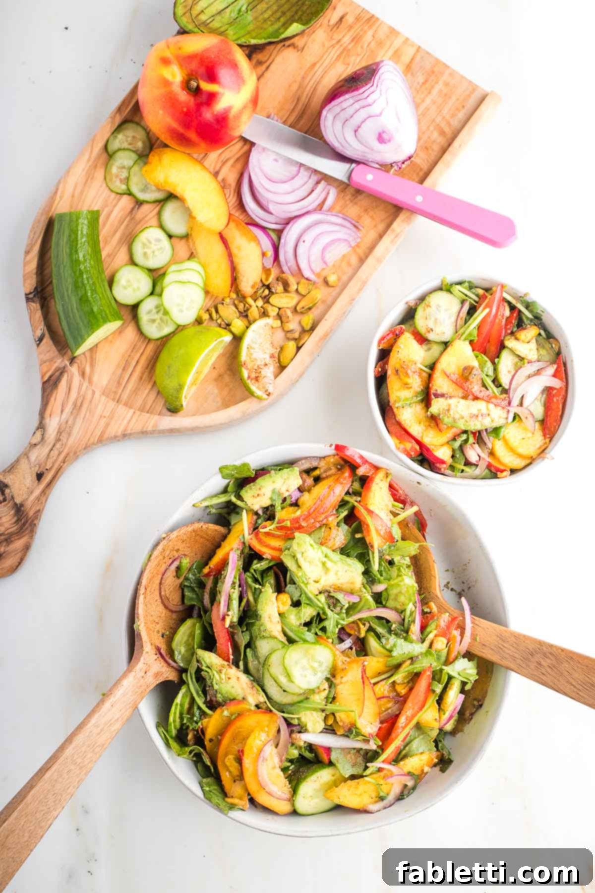 Vibrant Nectarine Arugula Salad 8 A large mixing bowl filled with Nectarine Salad ingredients, ready to be tossed, showing a medley of colors and textures.