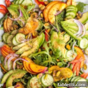 Vibrant Nectarine Arugula Salad 10 Slices of nectarines, avocados, peppers, onions over arugula, sprinkled with pistachios, cinnamon, lime salt and pepper.