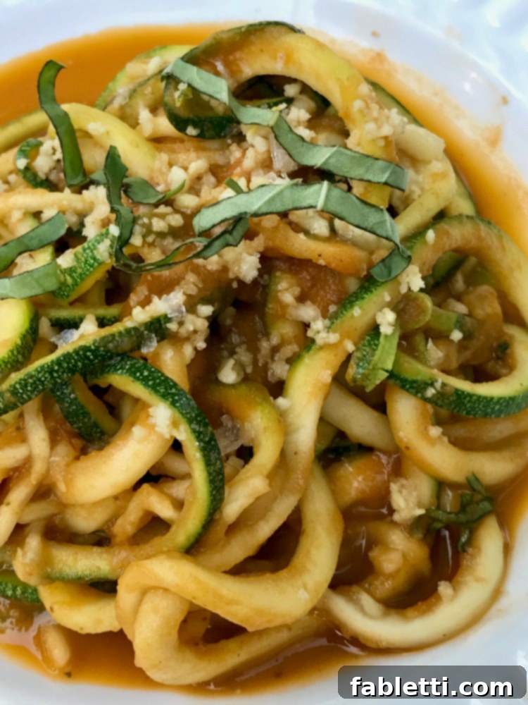 Rustic Roasted Tomato Sauce 10 Roasted Tomato Sauce served over zucchini noodles, garnished with pine nuts and fresh basil.