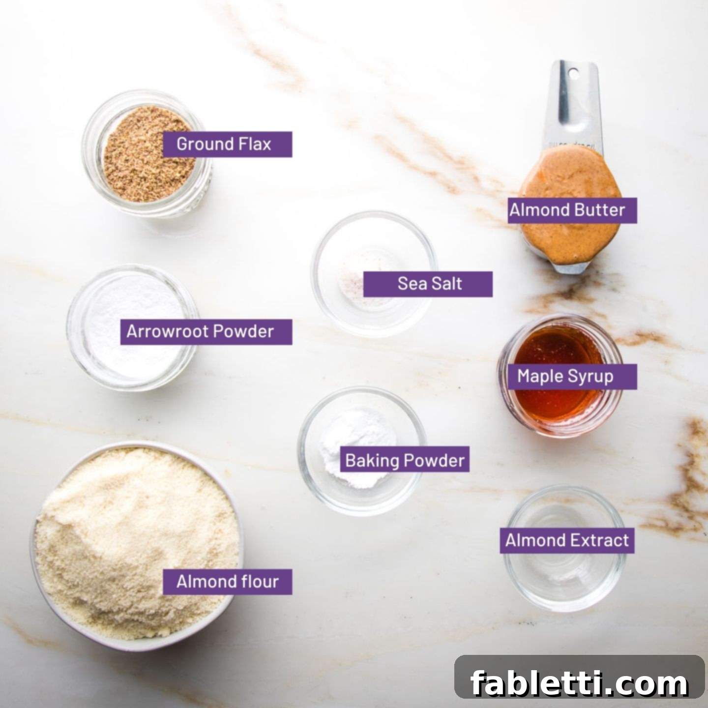 Almond Gem Cookies 4 Close-up of the dry ingredients for thumbprint cookies in a bowl: almond flour, arrowroot powder, ground flax, and sea salt.