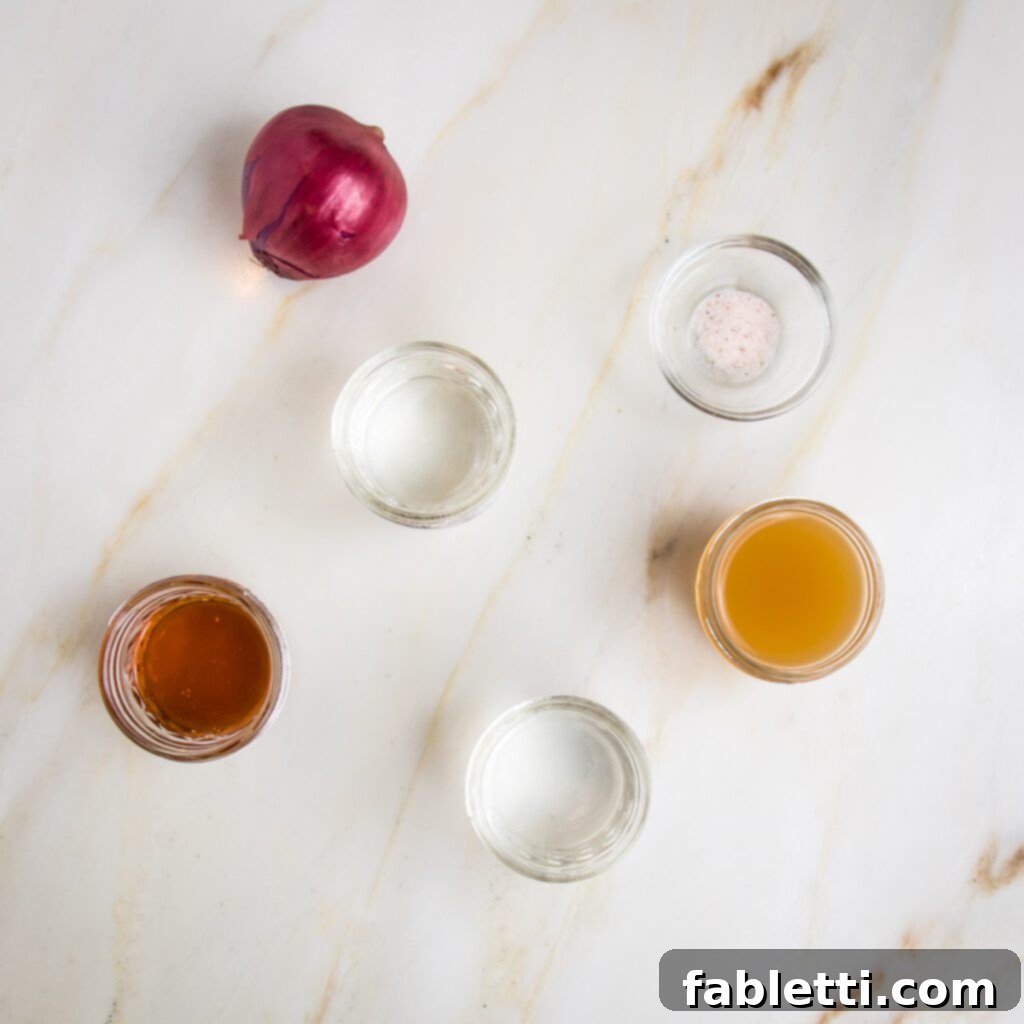 Deliciously Healthy Baked Falafel 14 Thinly sliced red onions ready for pickling.