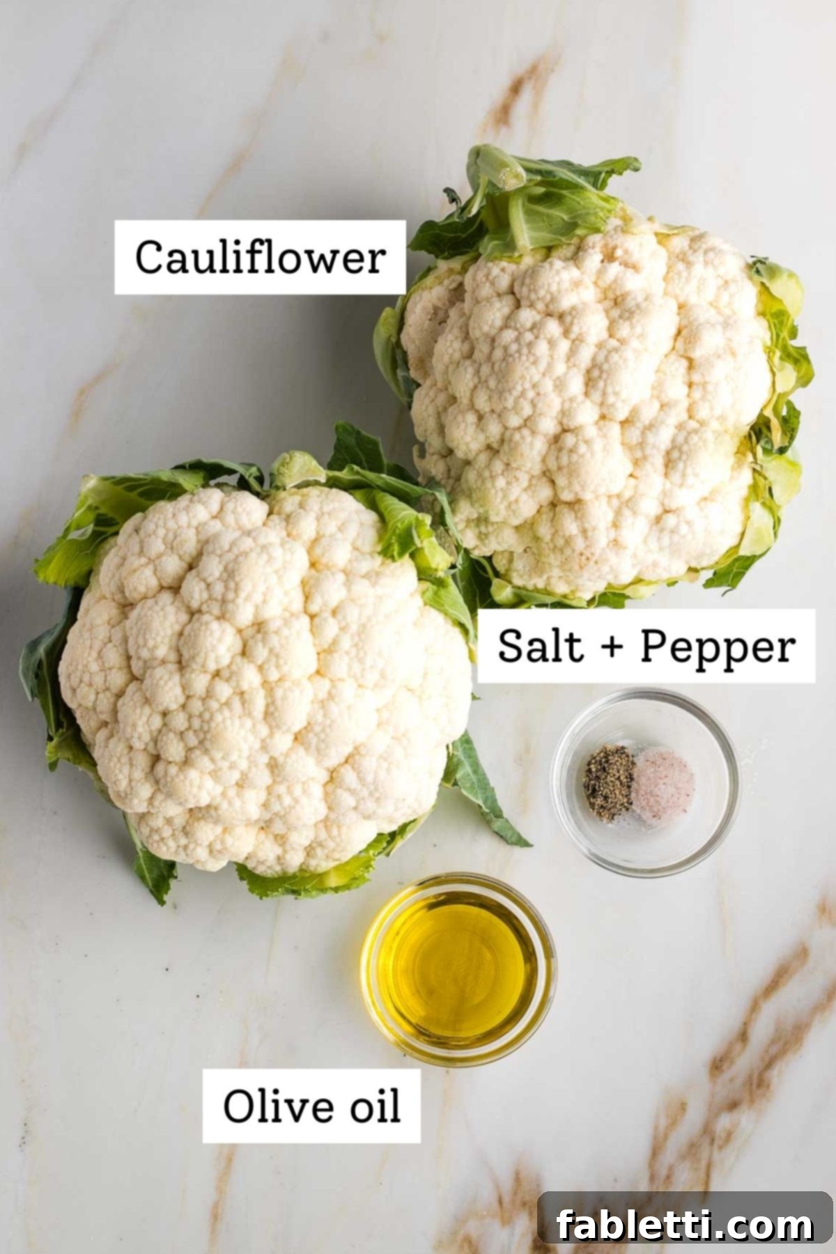 Golden Seared Cauliflower Steaks with Herbaceous Chimichurri 4 Labeled photo with cauliflower, olive oil, salt + pepper.