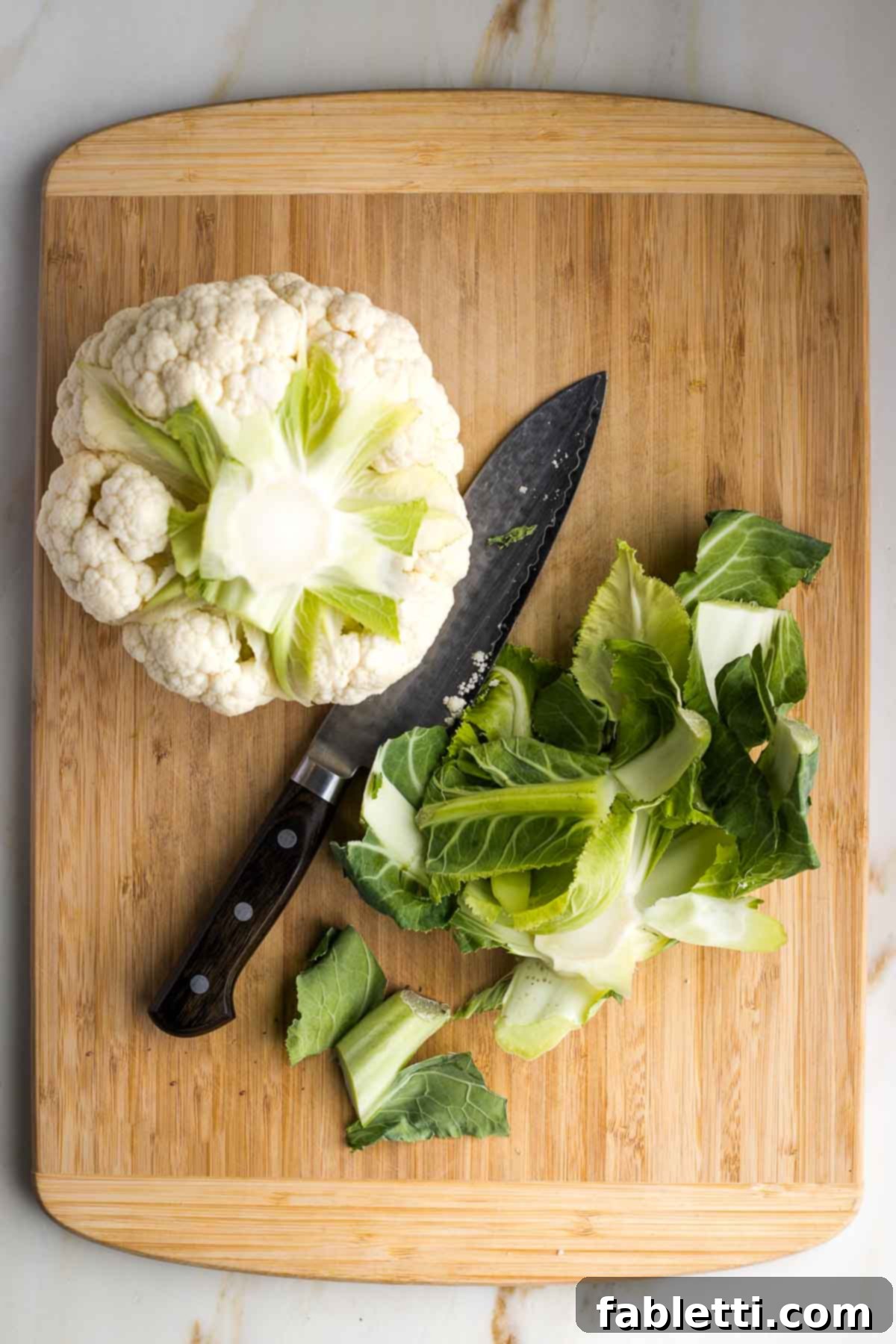Golden Seared Cauliflower Steaks with Herbaceous Chimichurri 6 Head of cauliflower with bottom, including outer leaves, cut off