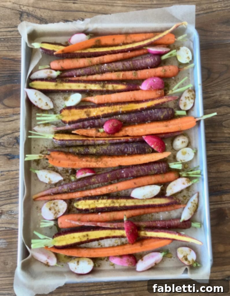 Roasted Vegetables with Carrot Top Pesto 5 Roasted Veggies with Carrot Top Pesto. A tray full of delicious vegetables.