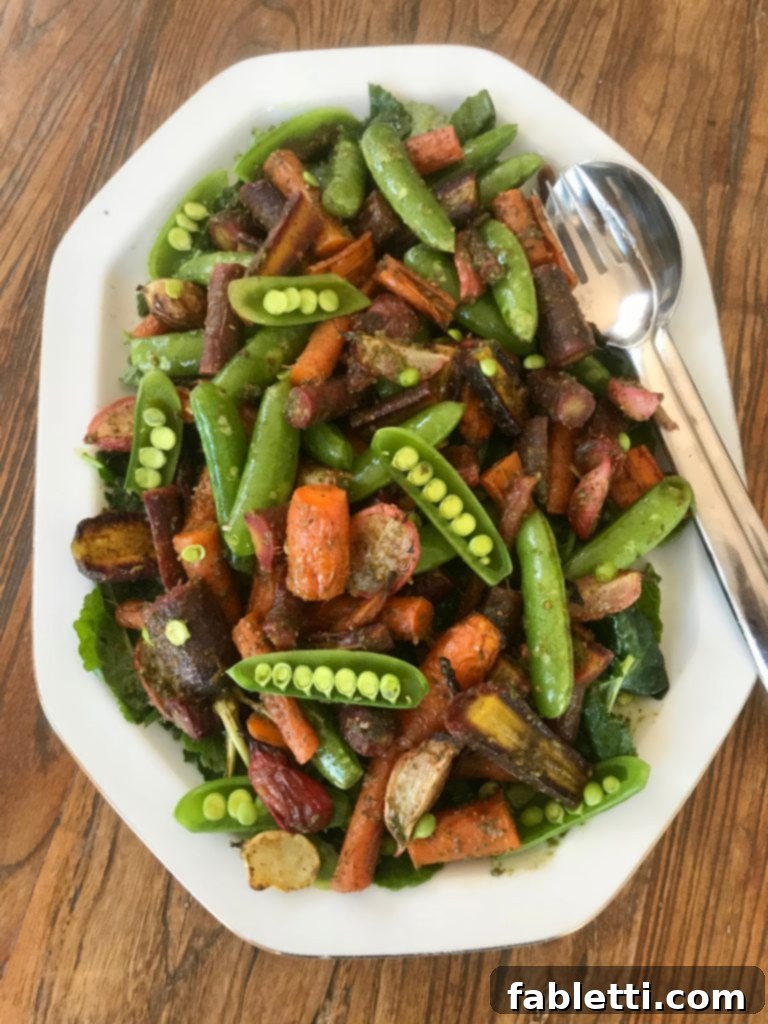 Roasted Vegetables with Carrot Top Pesto 9 Roasted Veggies with Carrot Top Pesto. Served on a bed of baby kale.