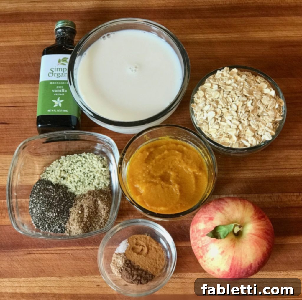 Wholesome ingredients laid out for making nutritious Pumpkin Overnight Oats, emphasizing real food choices.